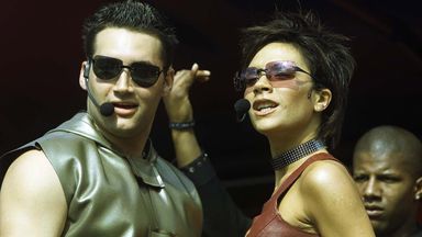 Victoria Beckham, the Spice Girls' Posh Spice, with Another Level's Dane Bowers, performing their song Out Of Your Mind on stage at the Radio 1 Road Show 'Big Sunday' outdoor music event in Middlesbrough in August 2000  